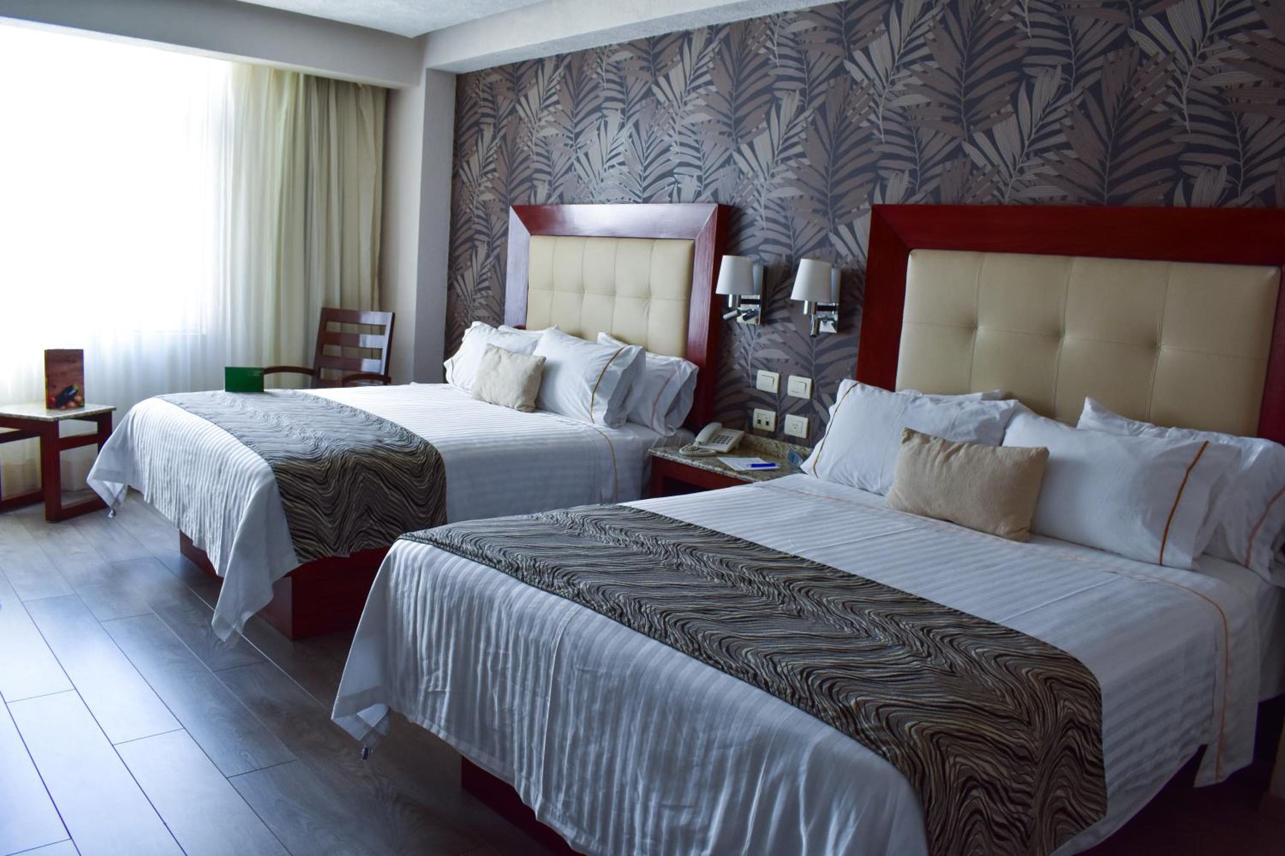 Habitación Doble con Dos Camas Dobles