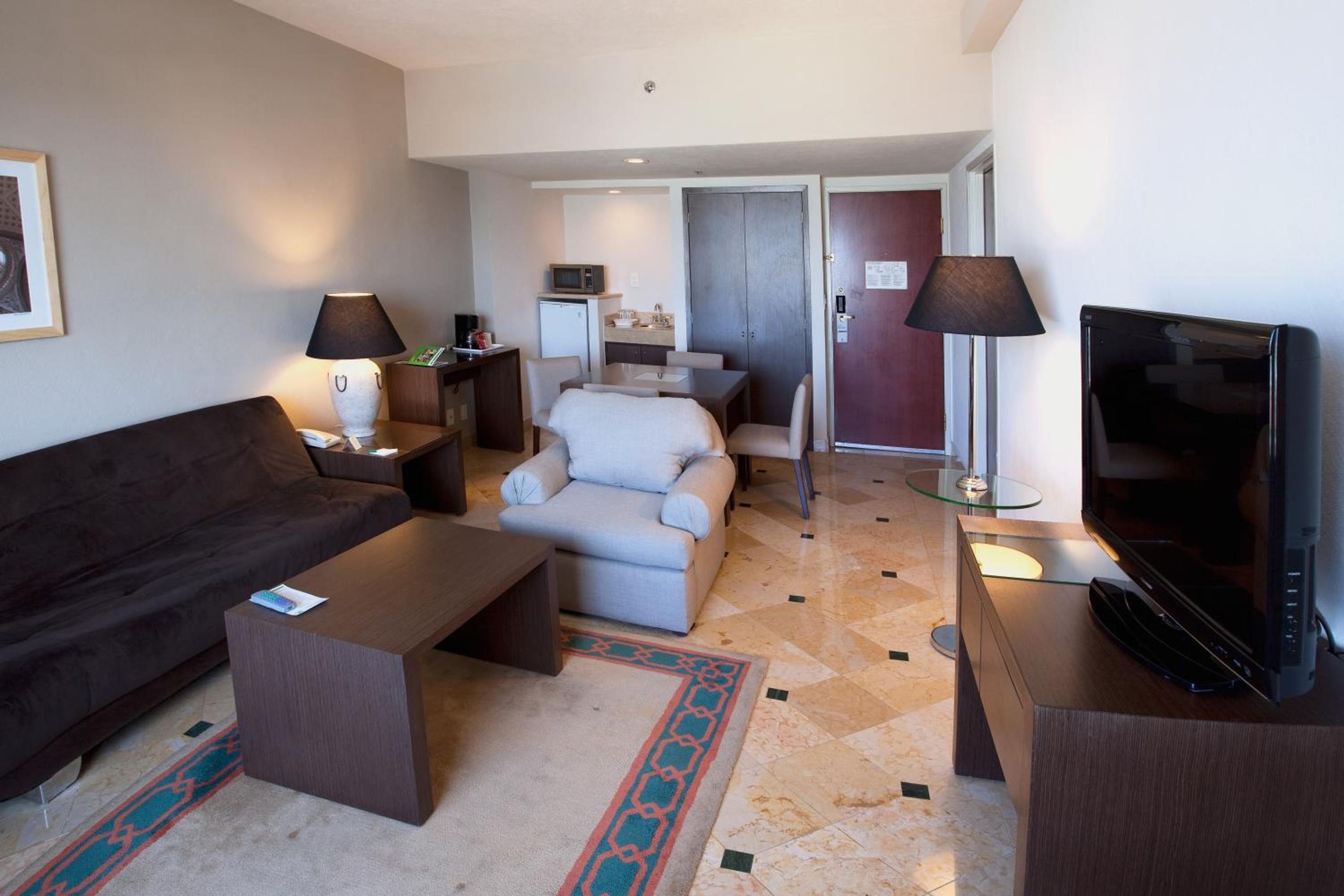 Suite de un dormitorio con cama King