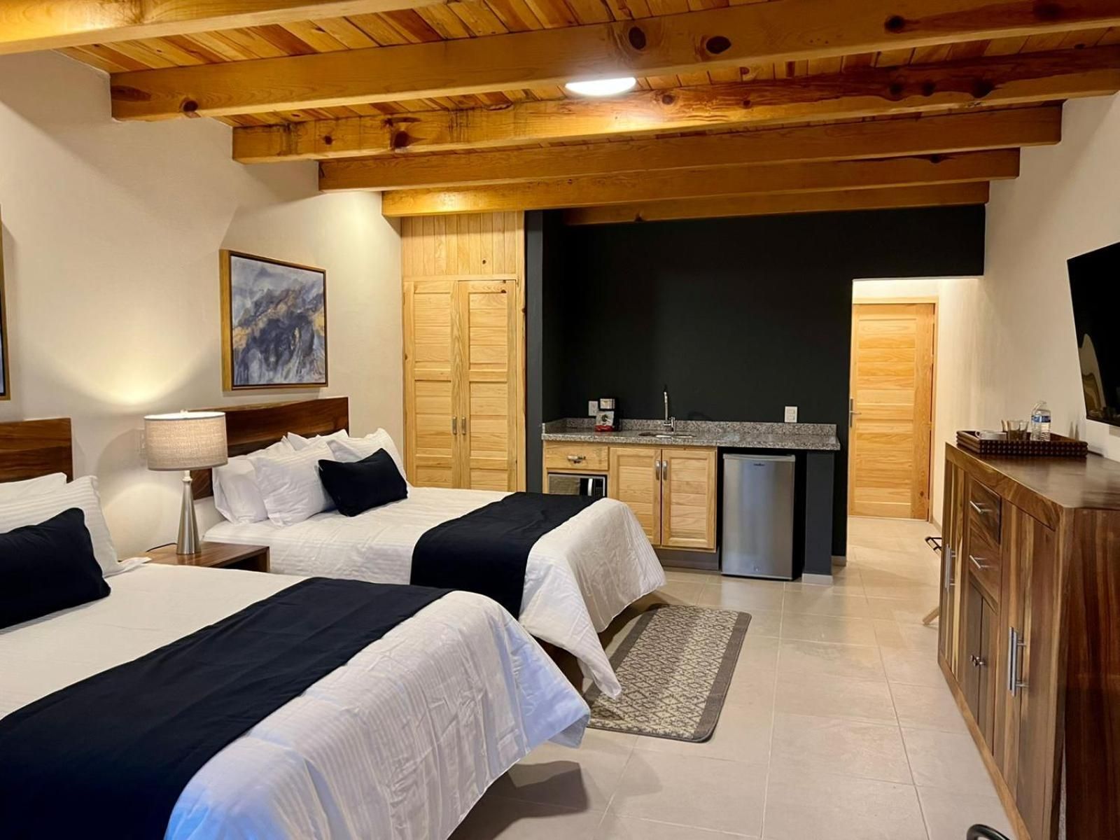 Habitación Doble Superior con Dos Camas Dobles — 4