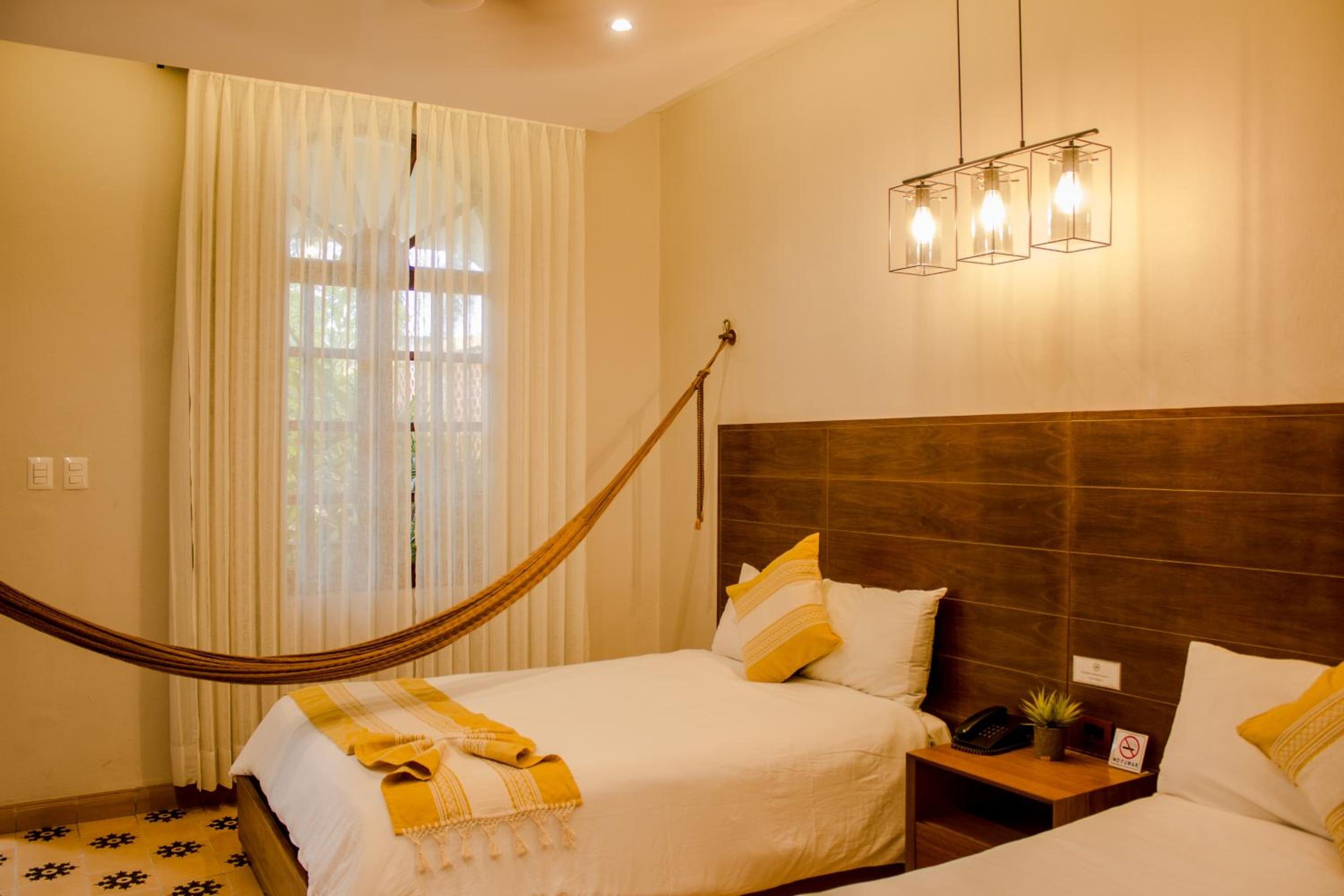 Habitación Doble con Dos Camas Dobles