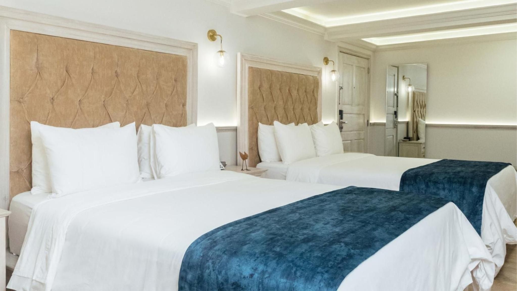 Suite Queen con Dos Camas Queen — 3