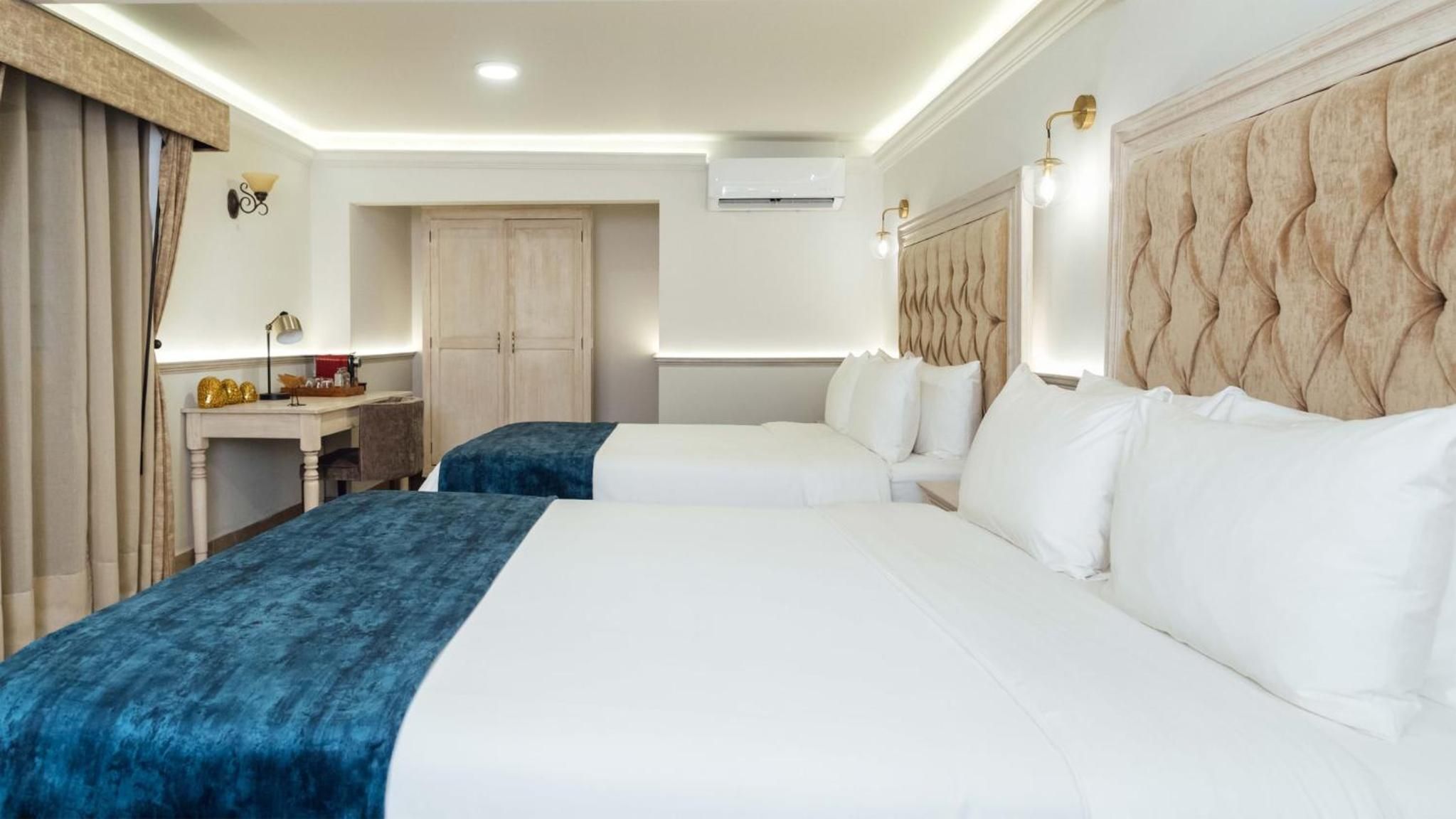 Suite Queen con Dos Camas Queen — 6