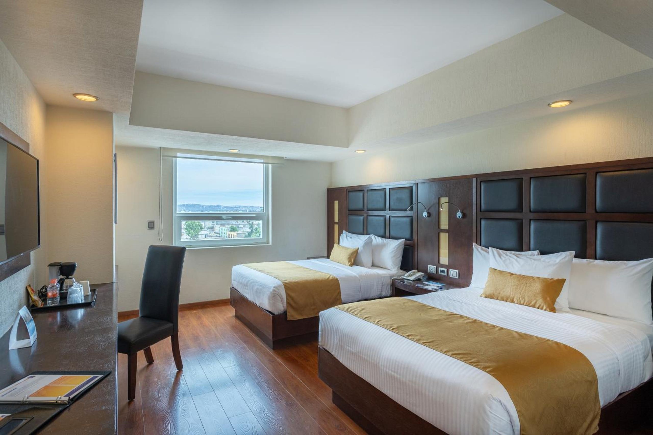 Habitación Queen con Dos Camas Queen