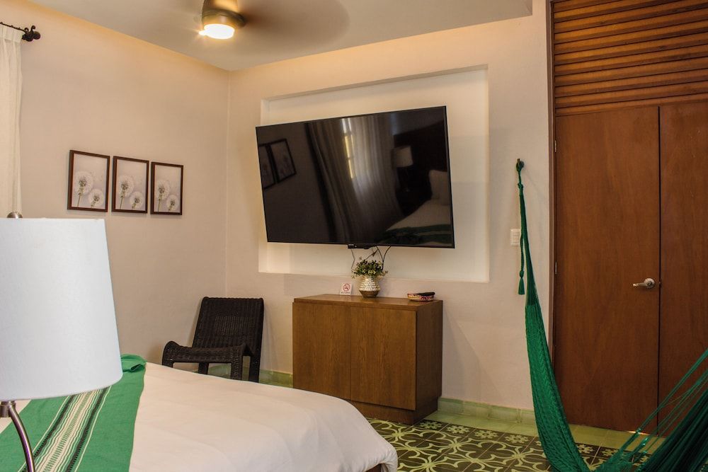 Junior Suite, 1 cama King con sofá cama, 2 Bathrooms, vista al jardín — 4