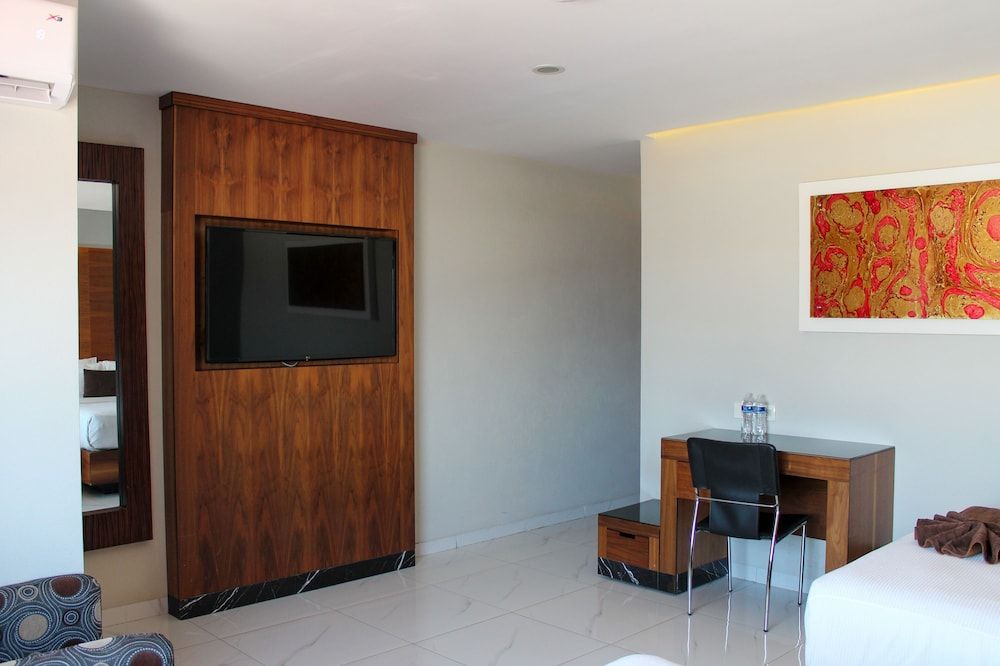 Habitación Ejecutiva, 1 cama King, vista a la ciudad — 8