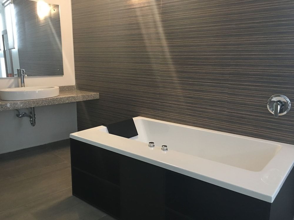 Suite Deluxe, 1 cama King con sofá cama. — 4