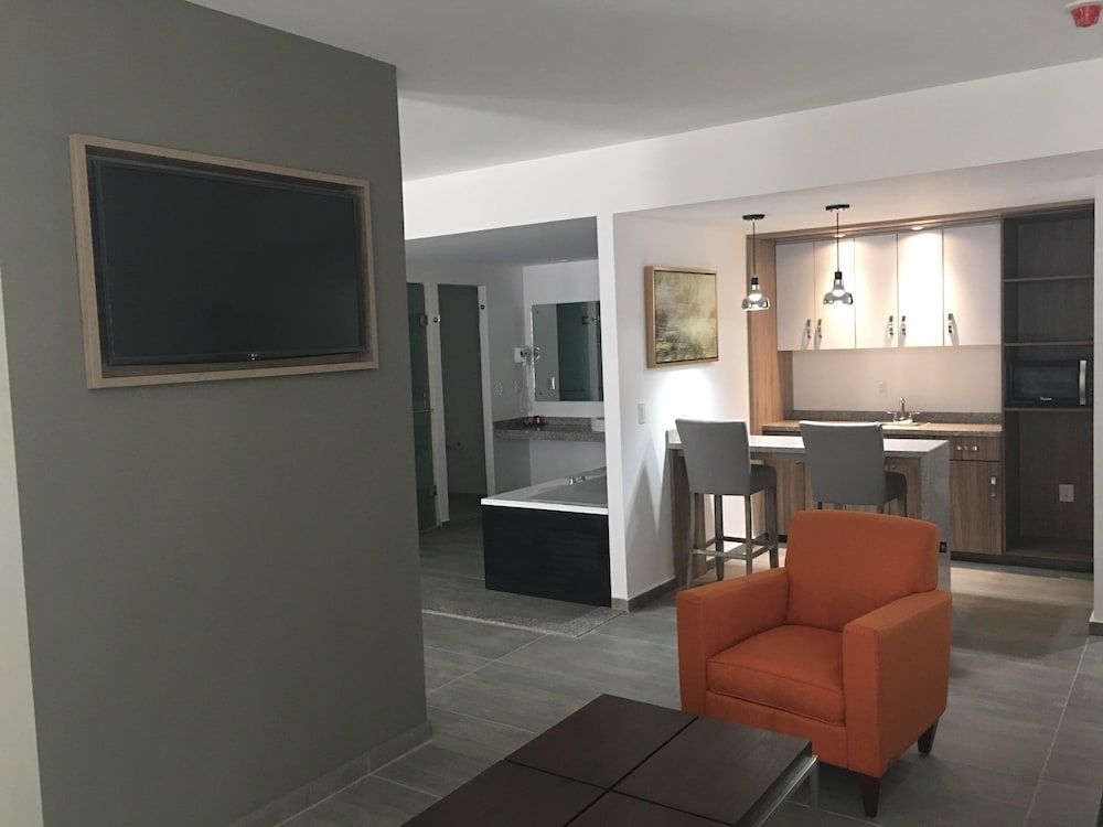 Suite Deluxe, 1 cama King con sofá cama. — 7