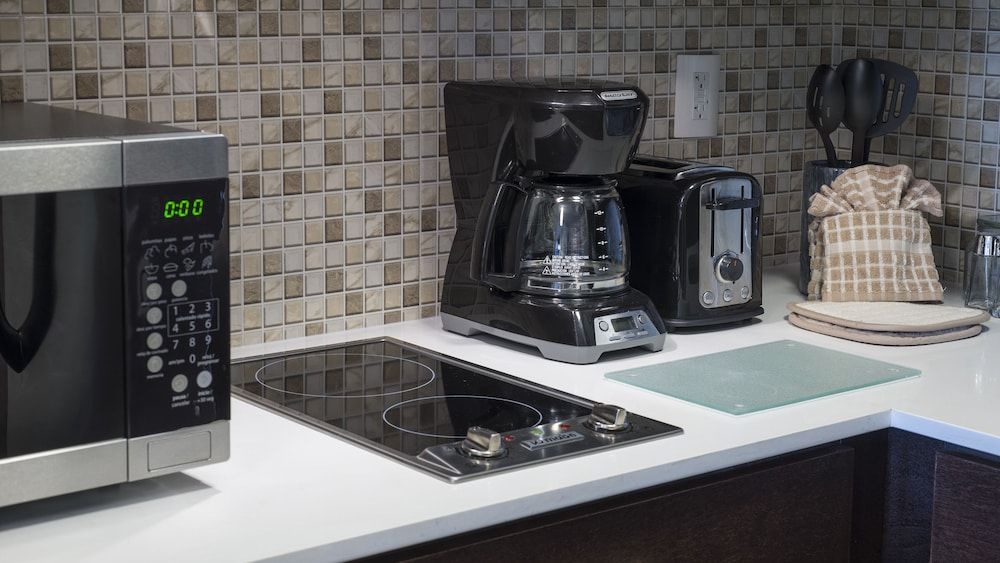 Studio Suite, Kitchen, vista a la alberca — 6