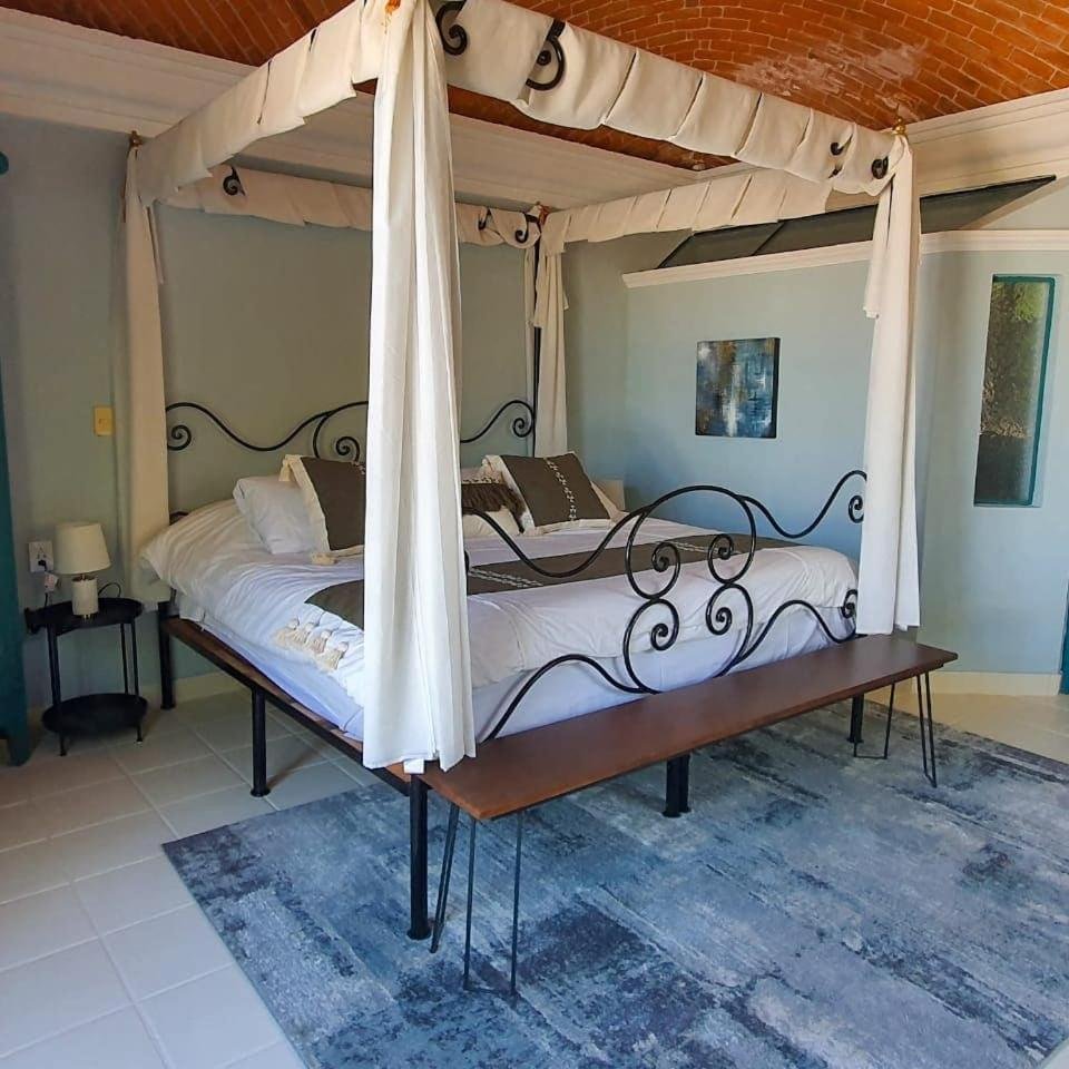 Suite King con Balcón — 2