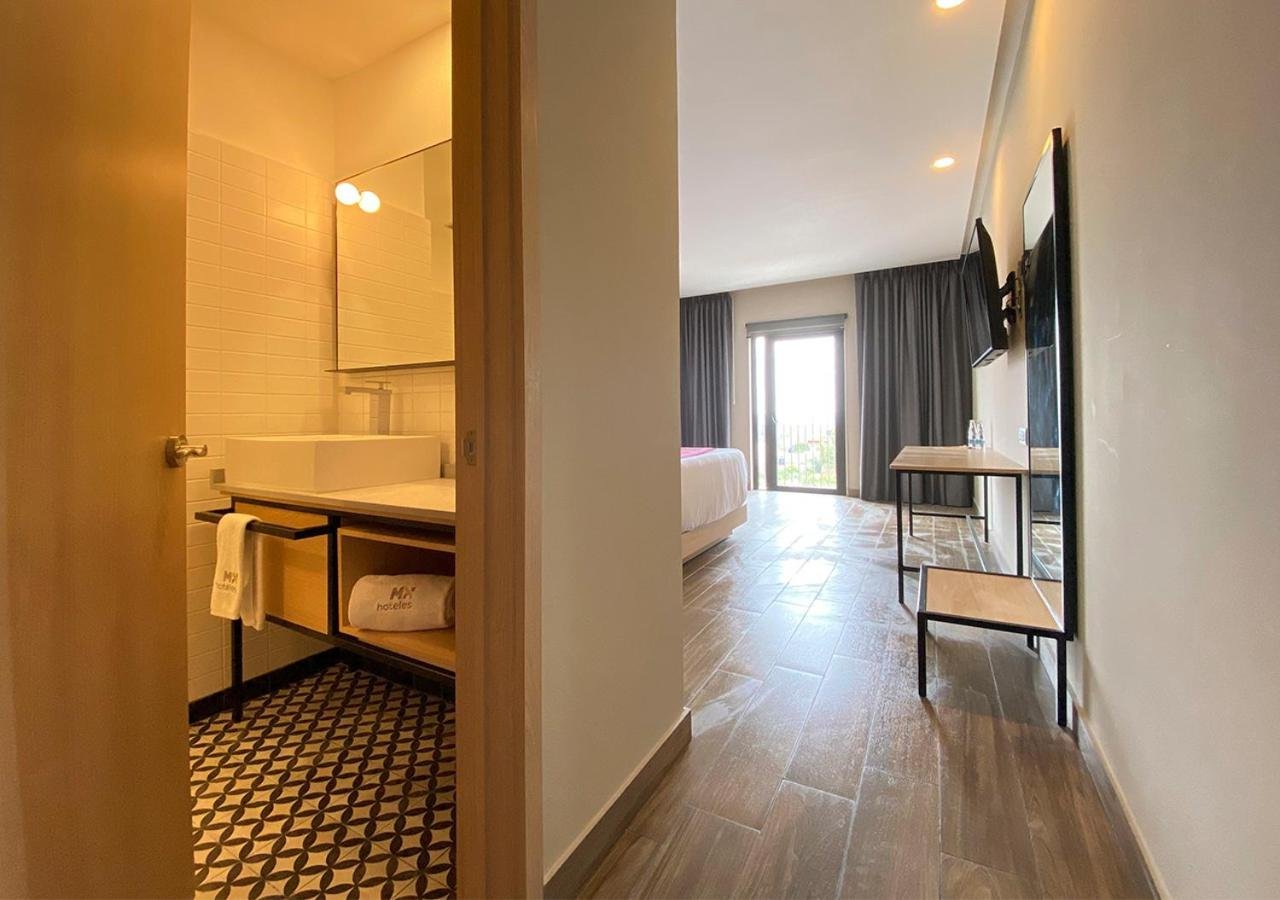 Habitación Estándar con Cama Queen