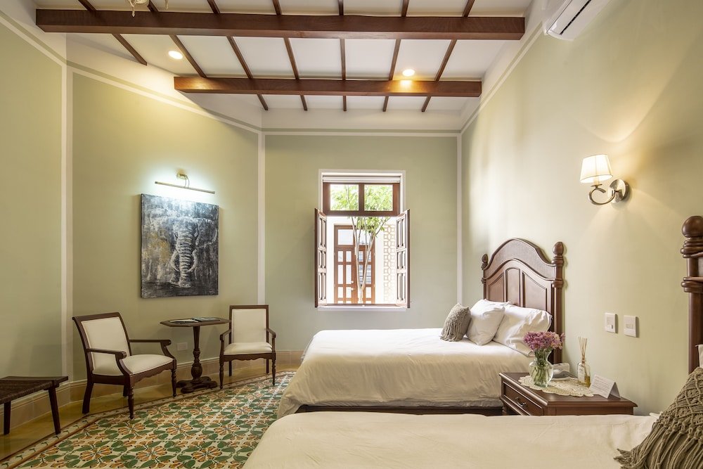Deluxe Quadruple Room — 2