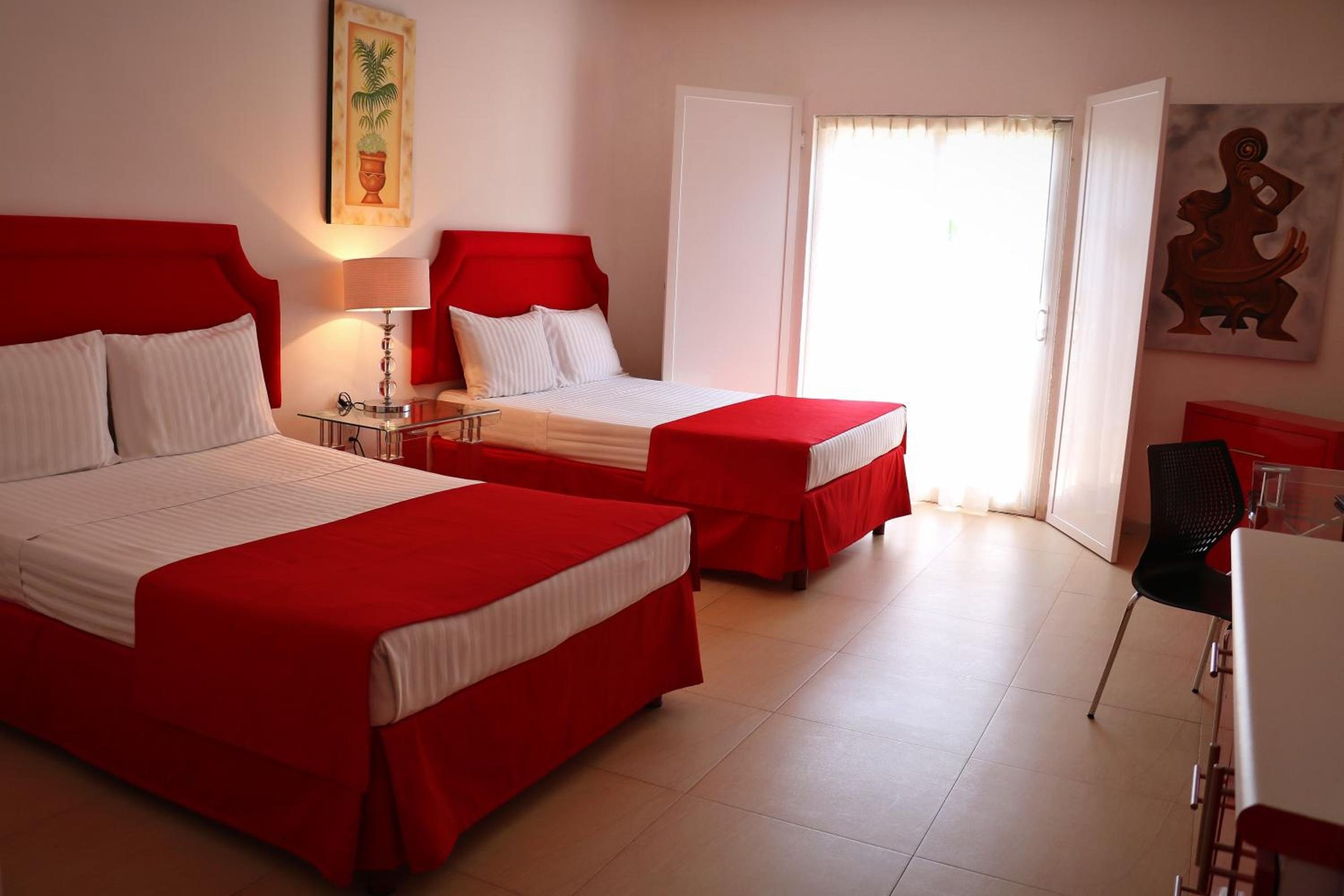 Habitación Doble con Dos Camas Dobles