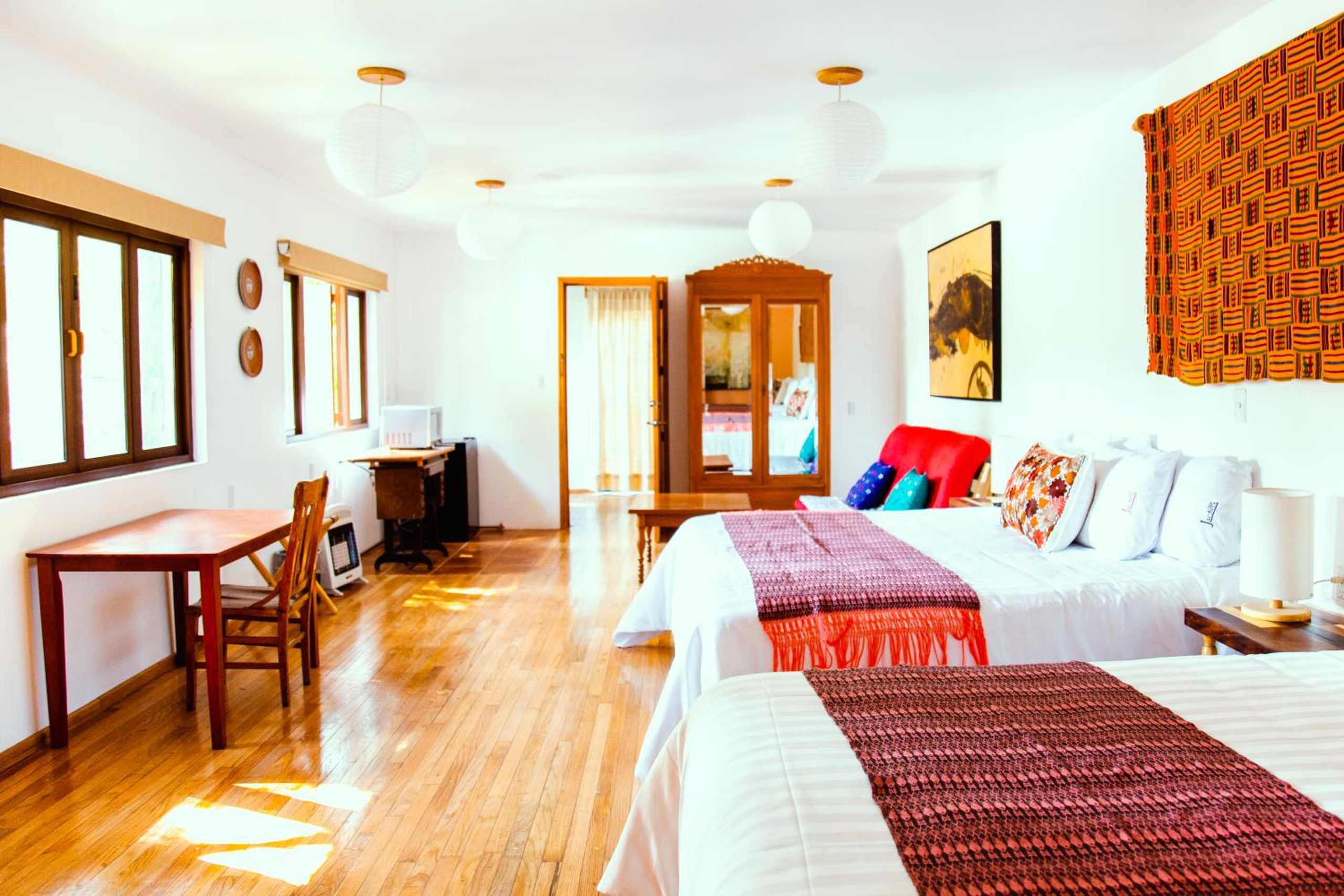 Habitación Doble Deluxe con Dos Camas Dobles