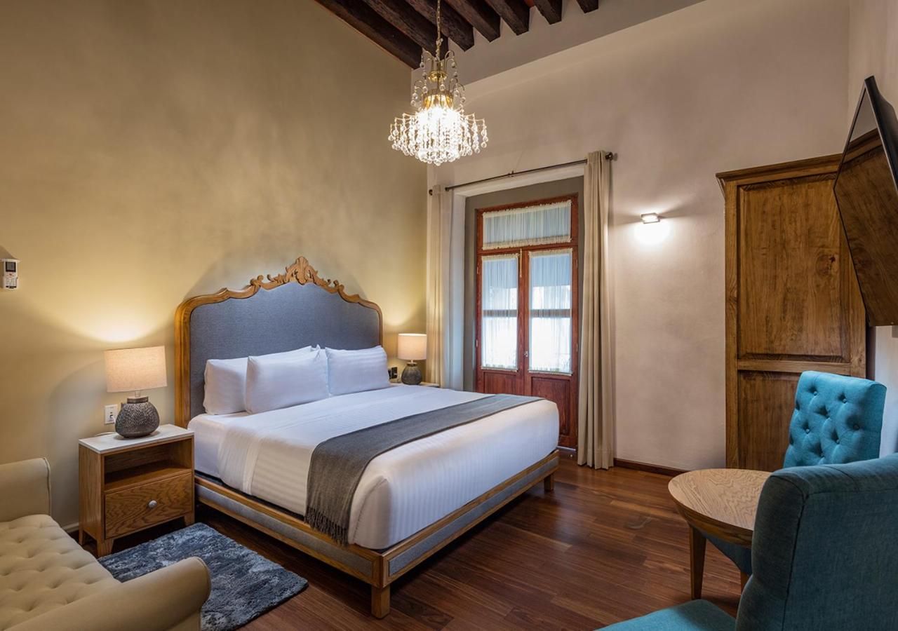 Habitación King con Balcón