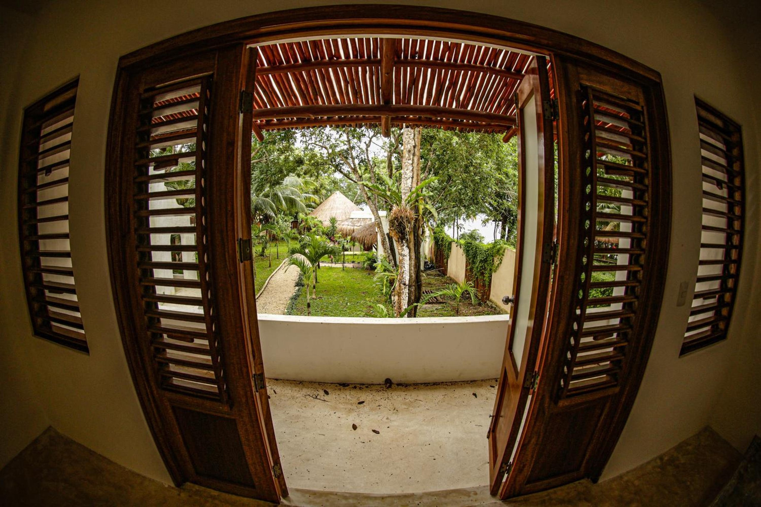 Habitación Queen con vista al jardín — 7
