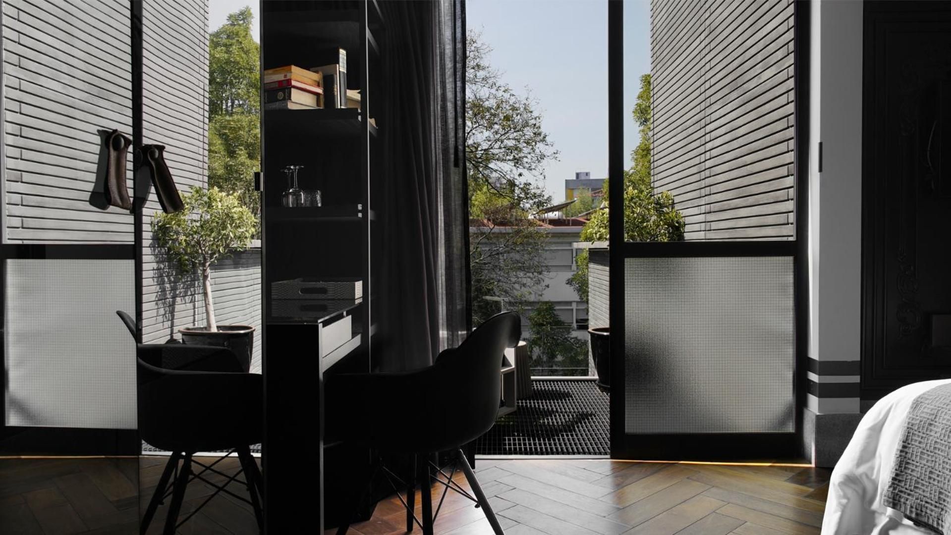 Suite Junior con Balcón — 2