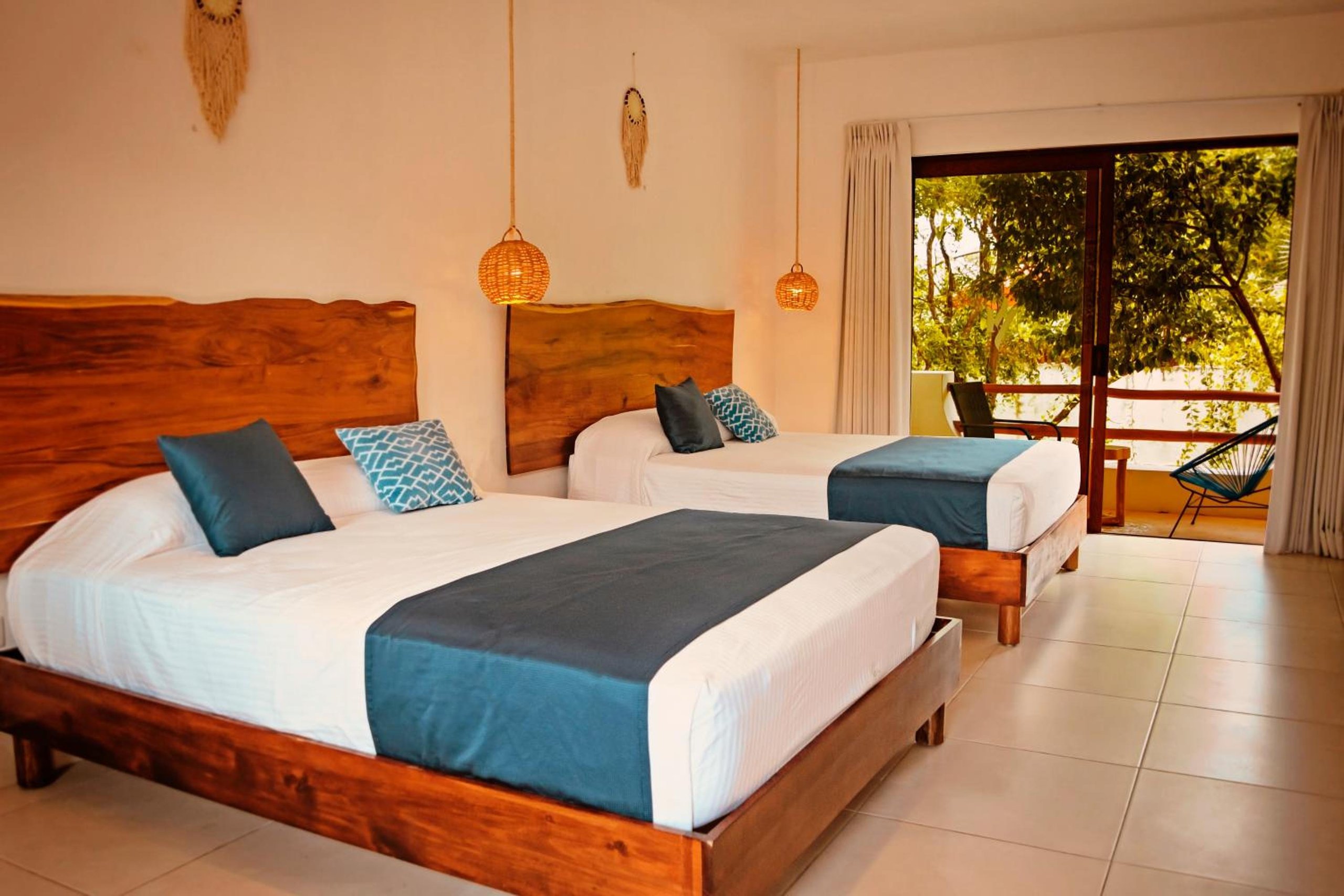 Habitación Doble Deluxe con Dos Camas Dobles