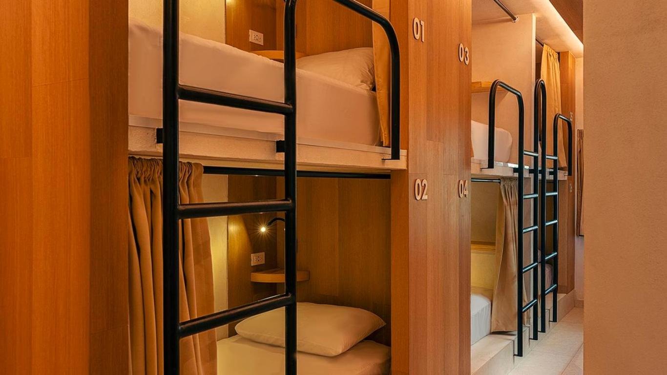 Cama en Dormitorio Mixto de 12 Camas