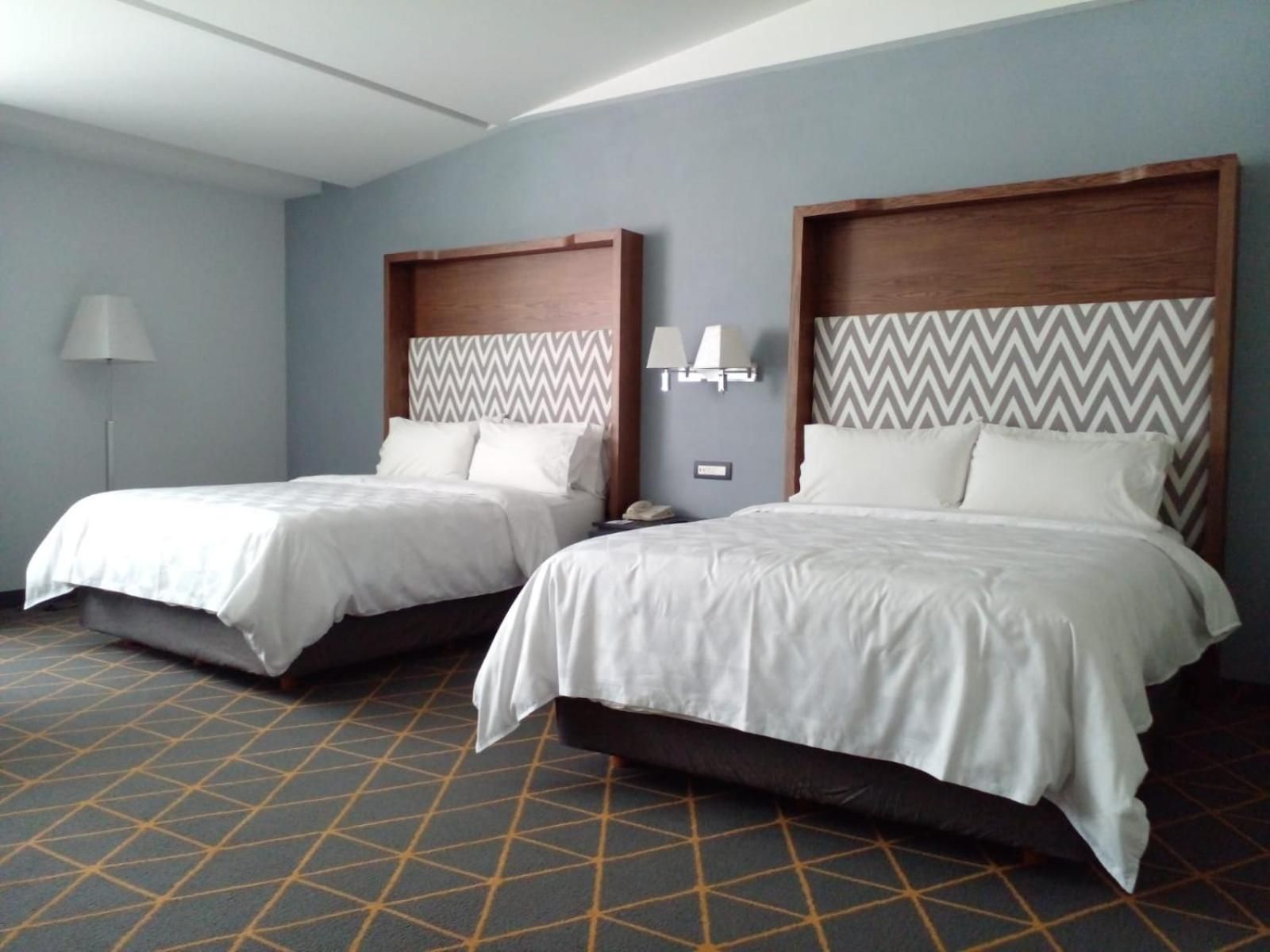 Habitación Estándar Doble con Dos Camas Dobles