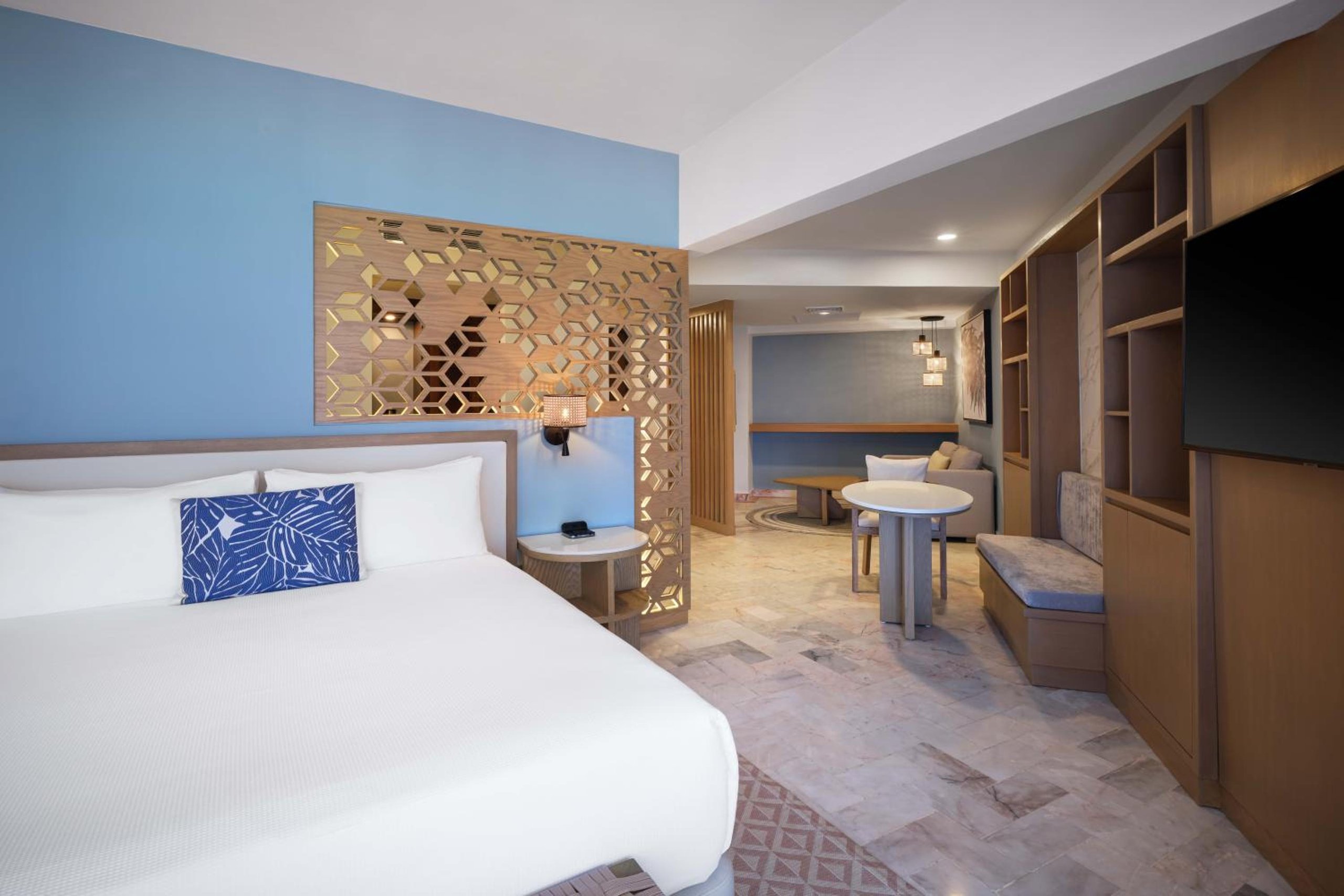 Suite Ejecutiva con una cama King y dos camas dobles, para no fumadores