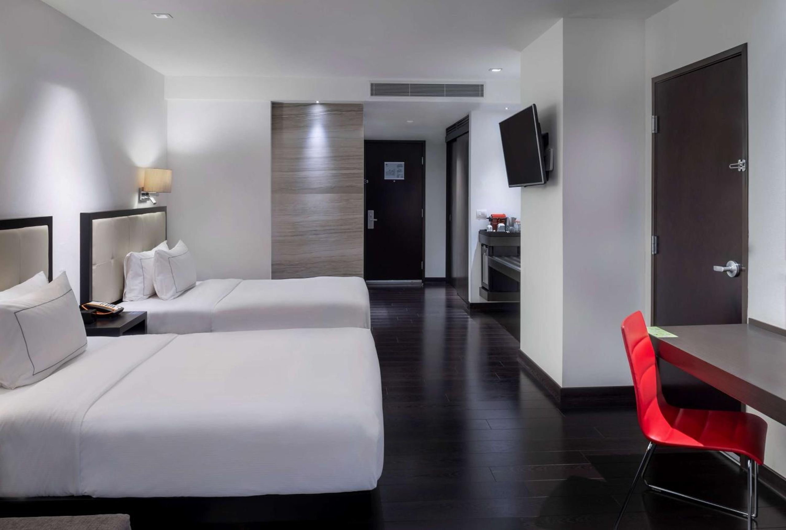 Habitación Queen con Dos Camas Queen