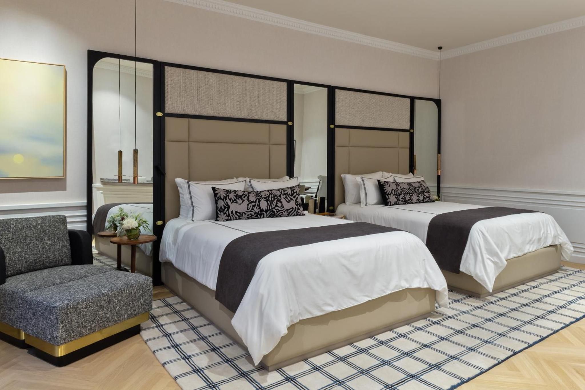 Habitación Deluxe Queen con Dos Camas Queen