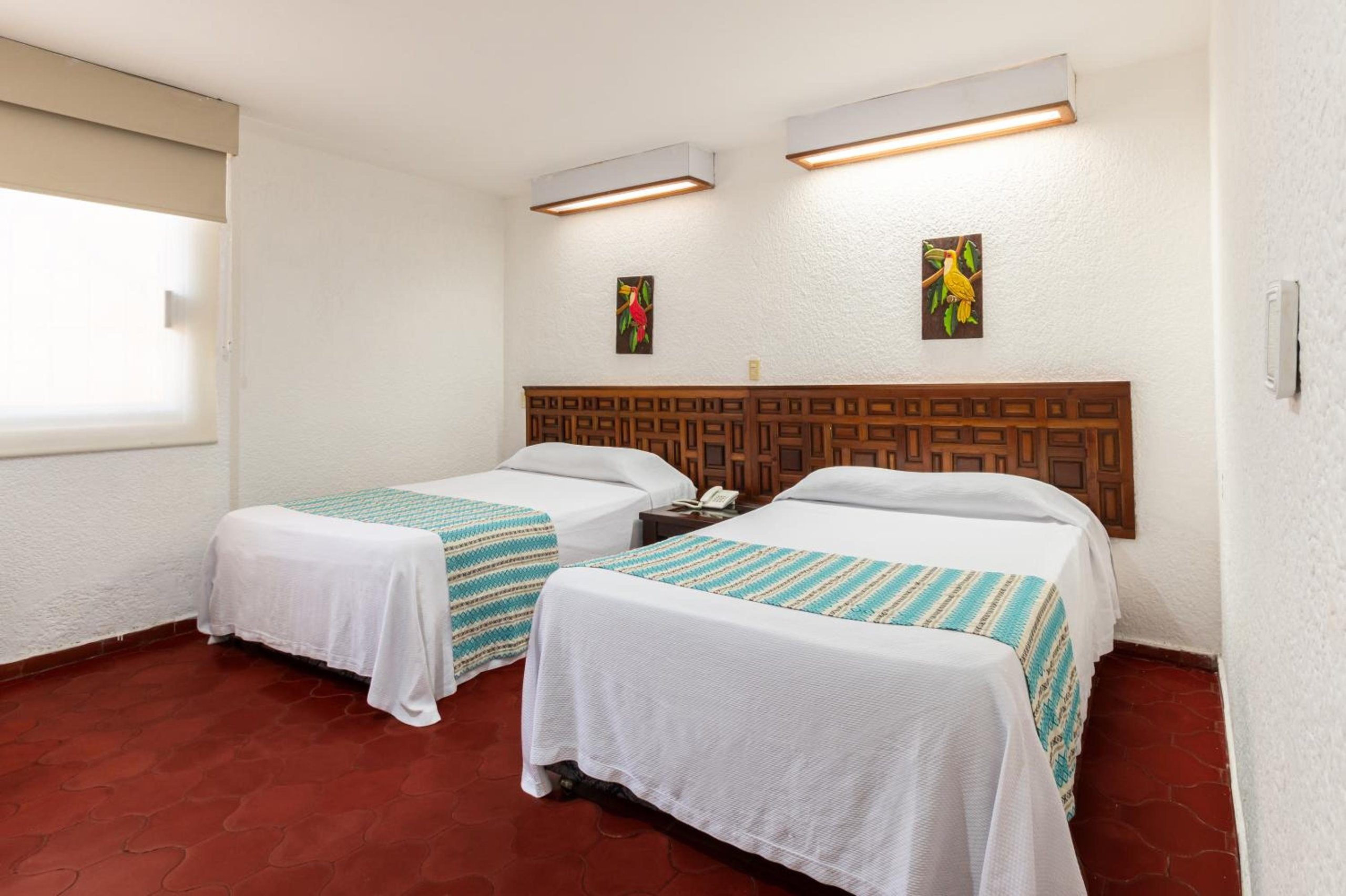 Habitación Doble con Dos Camas Dobles