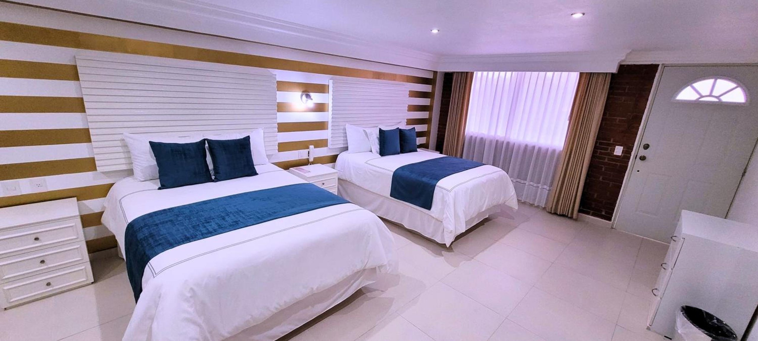 Habitación Doble con Dos Camas Dobles