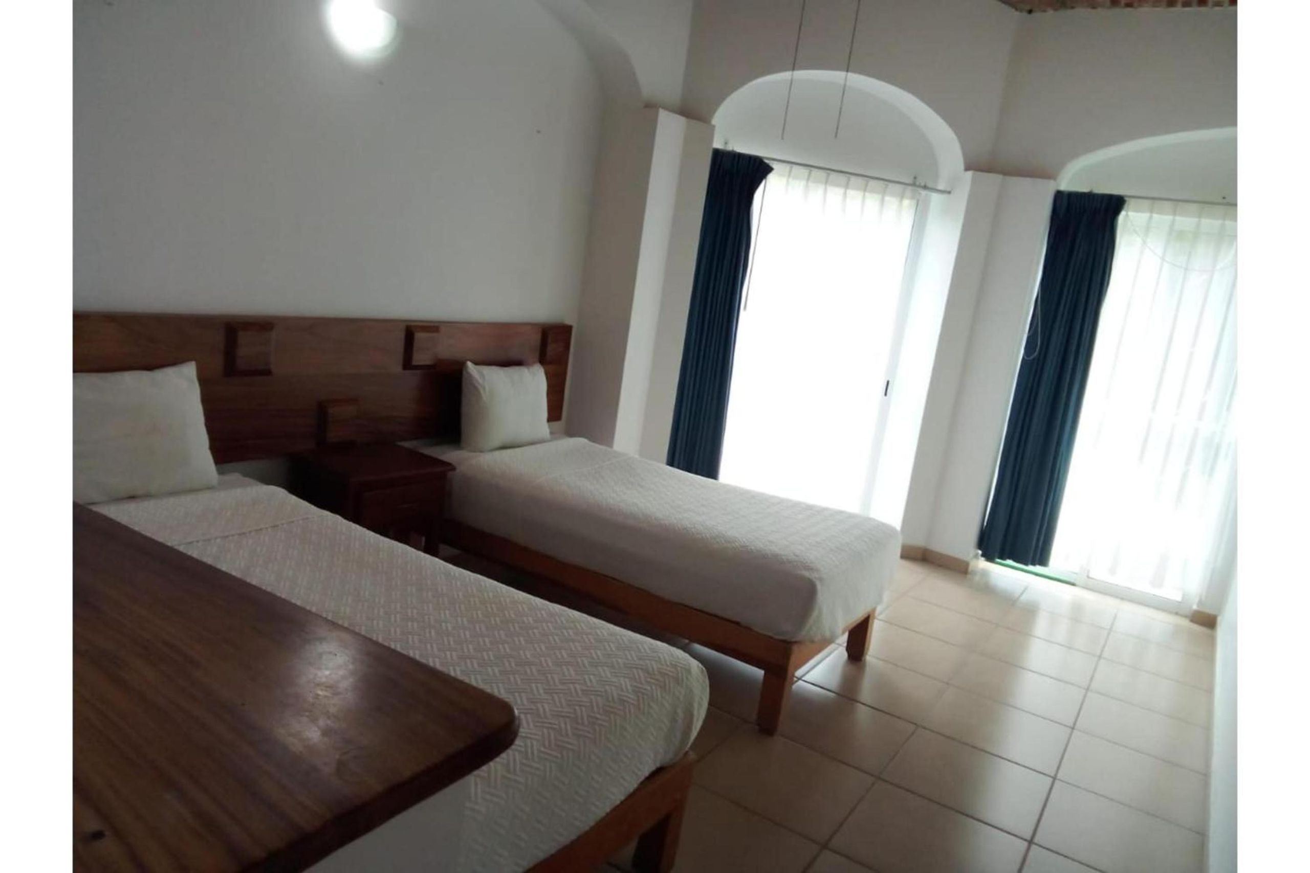 Habitación Estándar Doble con Dos Camas Dobles — 5