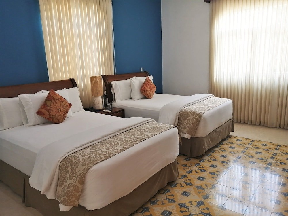 Habitación Deluxe Doble, 2 Camas Dobles — 6