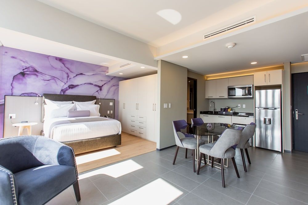 Junior Room, 1 cama King, Kitchenette, vista a la ciudad