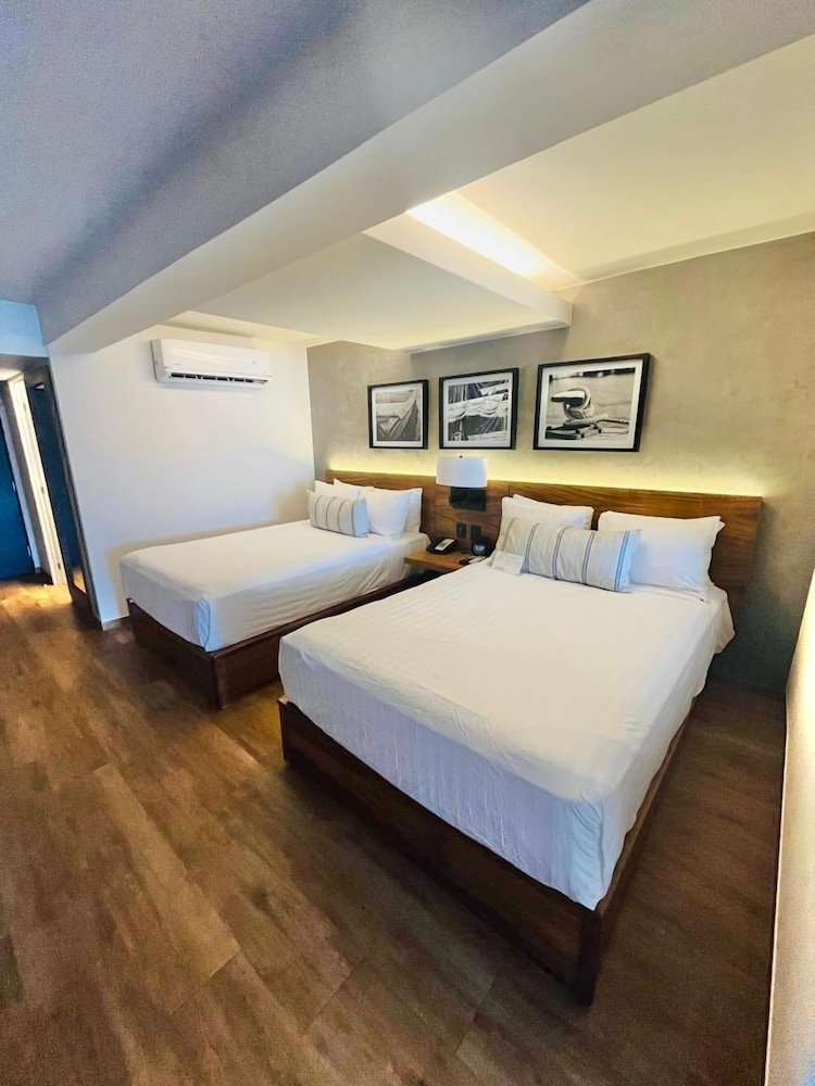 Junior Suite, 2 camas dobles, vista al mar