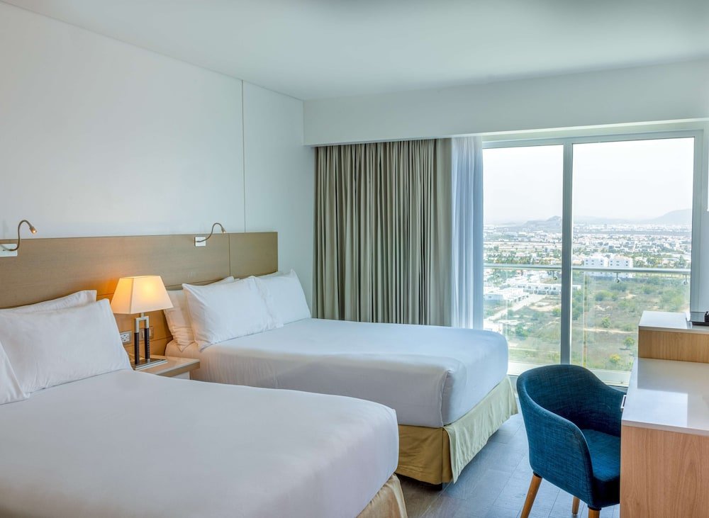 Junior Suite, 2 camas dobles, vista a la ciudad — 6