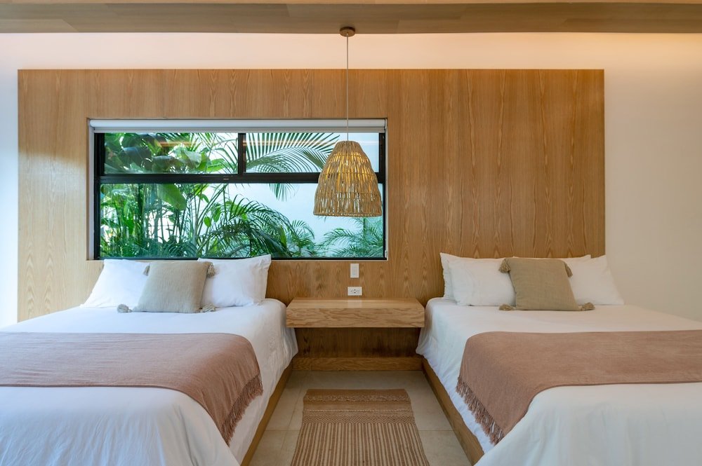 Deluxe Quadruple Room — 8