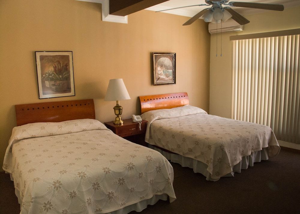 Family Suite (Master, 4 camas dobles)