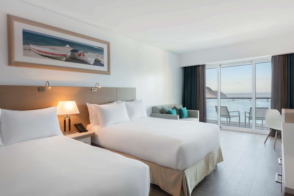 Junior Suite, 2 camas dobles, vista a la ciudad — 2