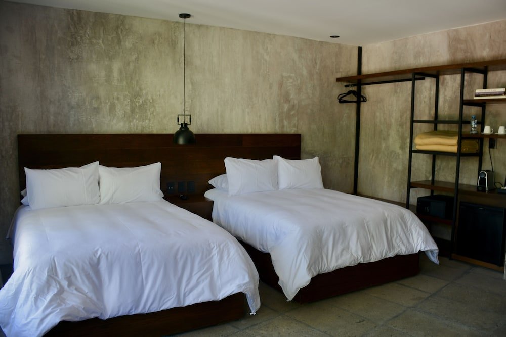 Habitación Junior, 2 camas dobles, vista al jardín
