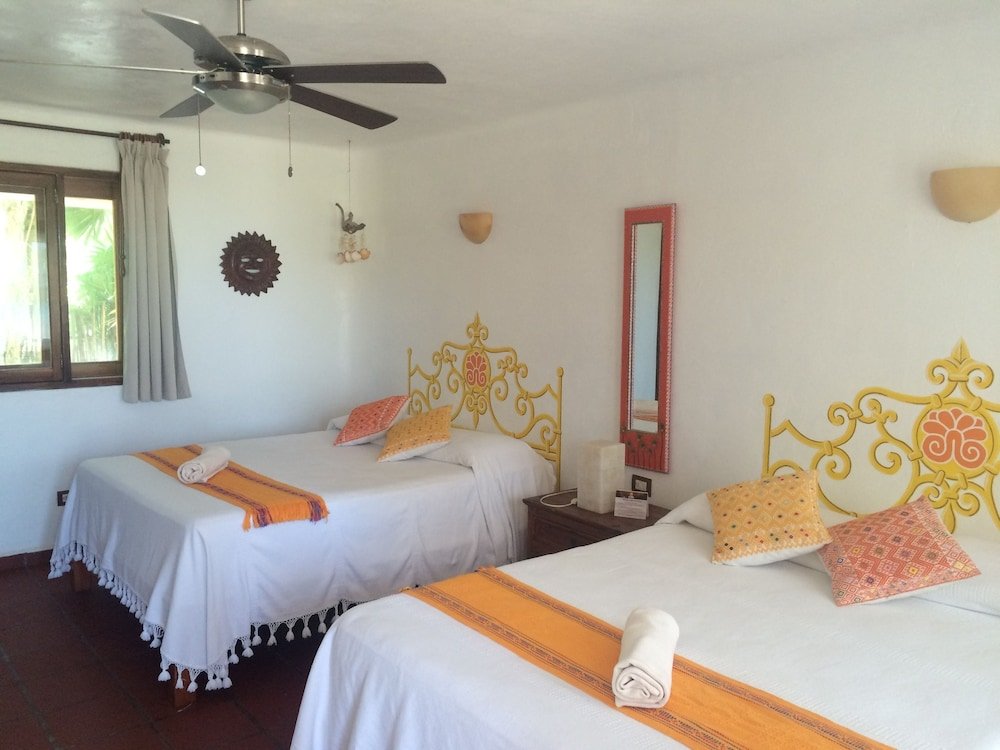 Room, 2 camas Queen, vista al mar — 7
