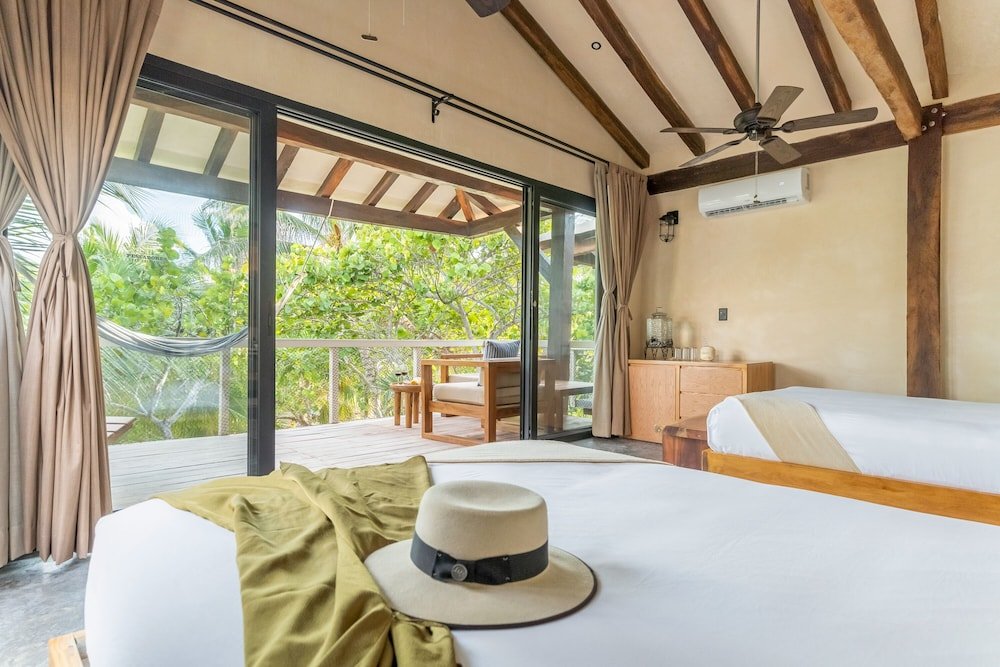Habitación Deluxe, 2 camas Queen, vista al jardín — 2