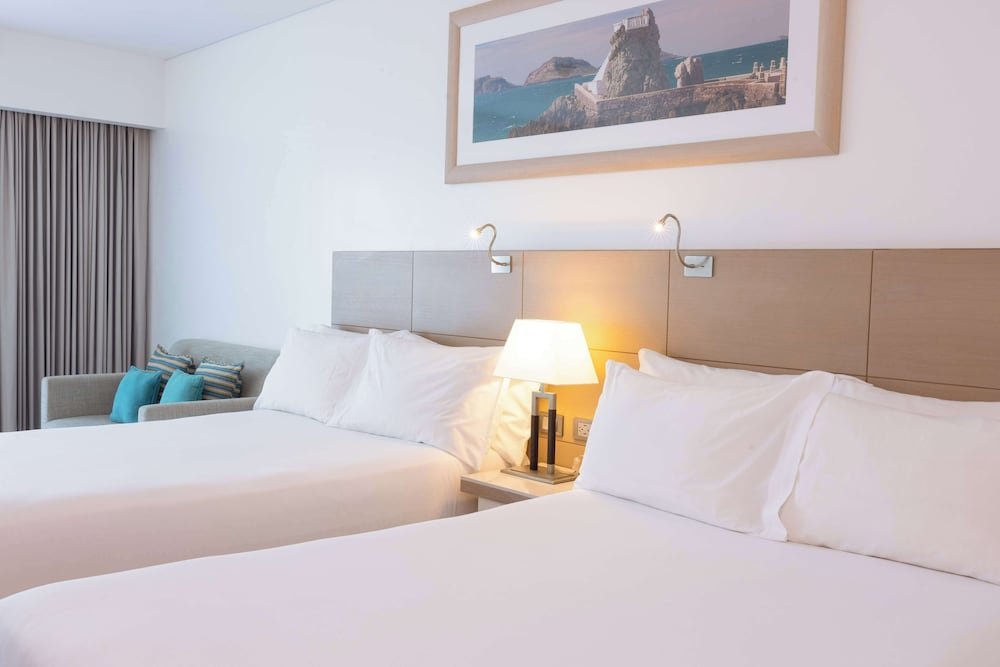 Junior Suite, 2 camas dobles, vista a la ciudad — 4