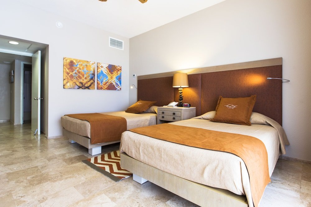 Junior Suite, 2 camas dobles, vista al mar — 3