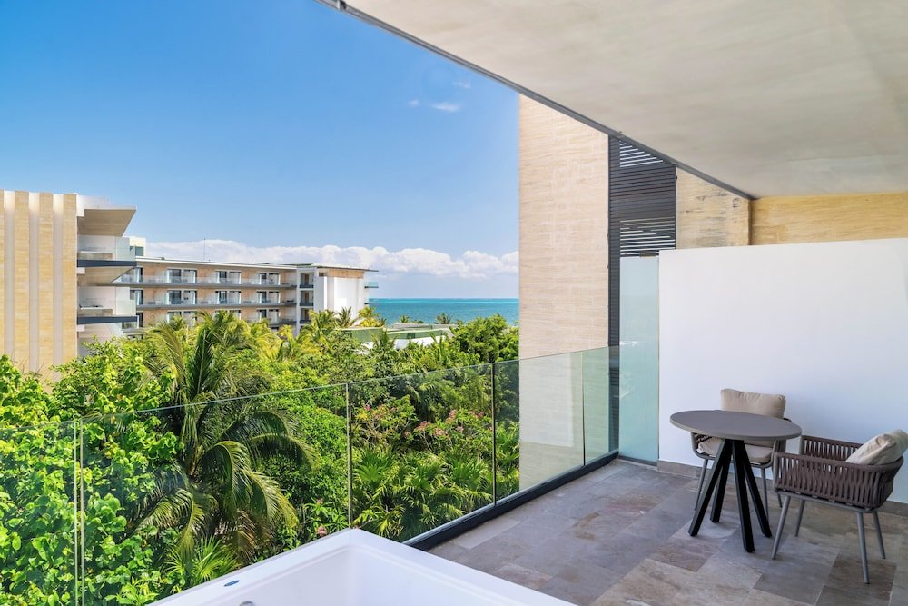 Junior Suite, 2 camas dobles, Partial vista al mar — 3