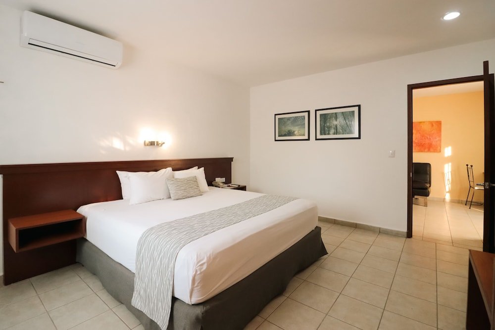 Executive Studio Suite, 1 cama King, Refrigerator, vista al jardín