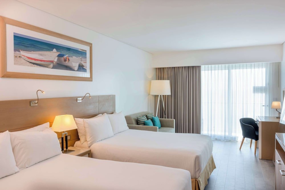 Junior Suite, 2 camas dobles, vista a la ciudad — 8