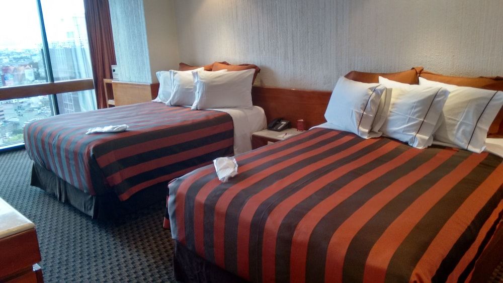 Superior Suite, 2 camas Queen, vista a la ciudad, Torre — 2