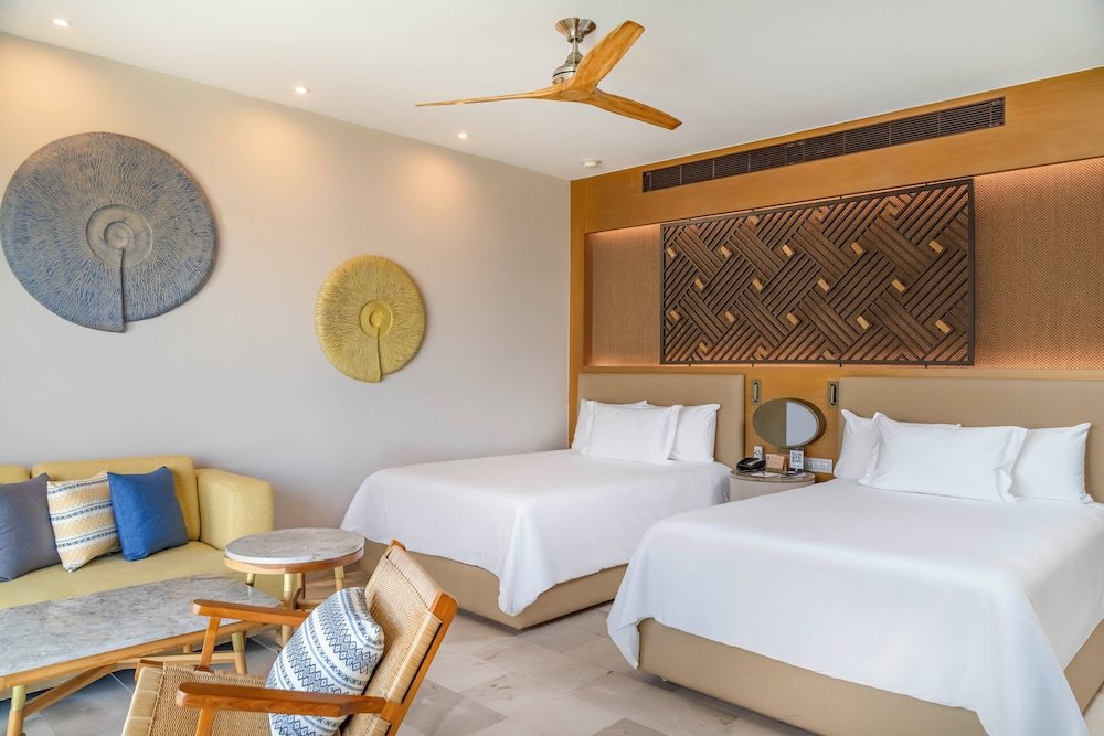 Junior Suite, 2 camas dobles, Partial vista al mar