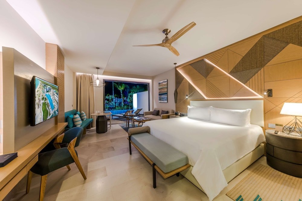 Suite Junior con salida directa parcial al mar — 2