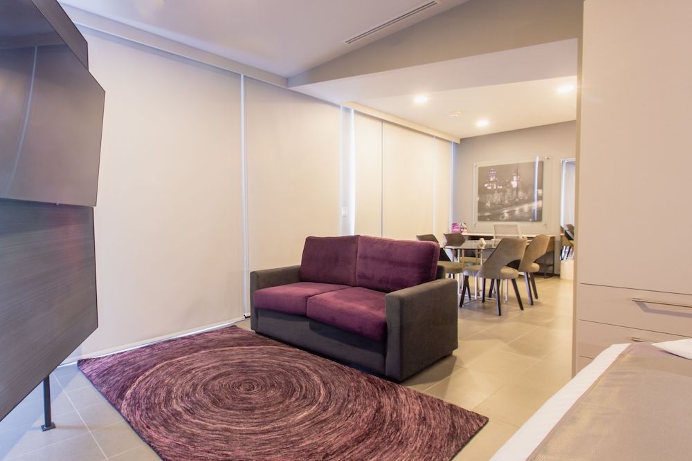 Junior Room, 1 cama King, Kitchenette, vista a la ciudad — 7