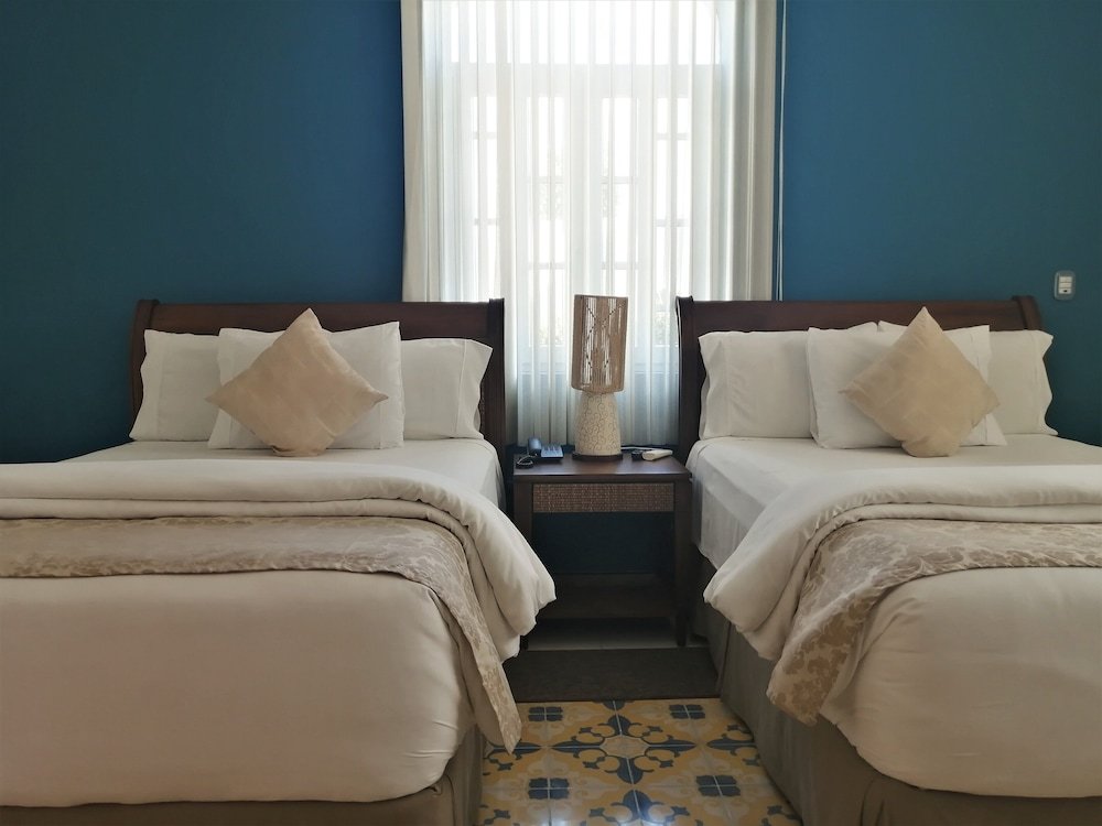 Habitación Deluxe Doble, 2 Camas Dobles — 4