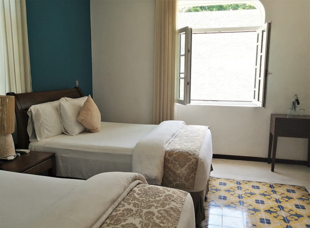Habitación Deluxe Doble, 2 Camas Dobles — 5